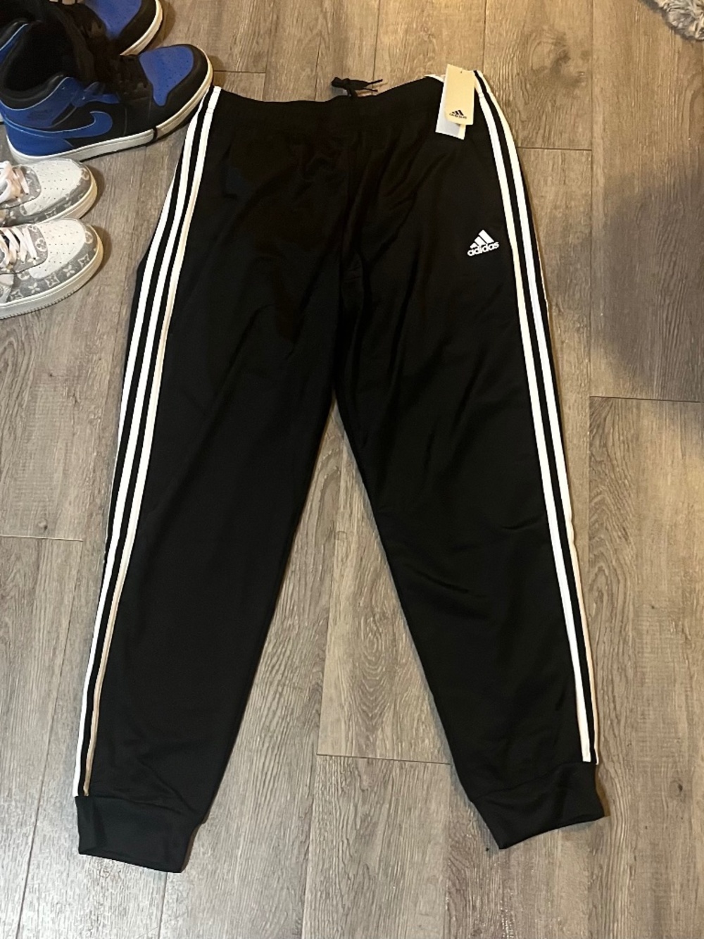 Brand new Adidas Classic 3 Stripe Adult Track pants. Large.